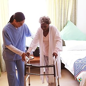 Nurse Assistant assisting patient